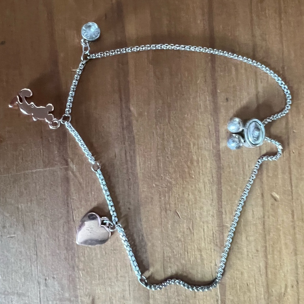 Disney Mickey Mouse bracelet, used, missing a couple charms